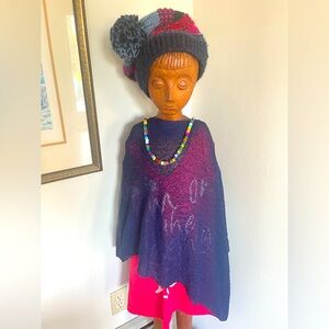 Van Klee dress topper in blue and black.